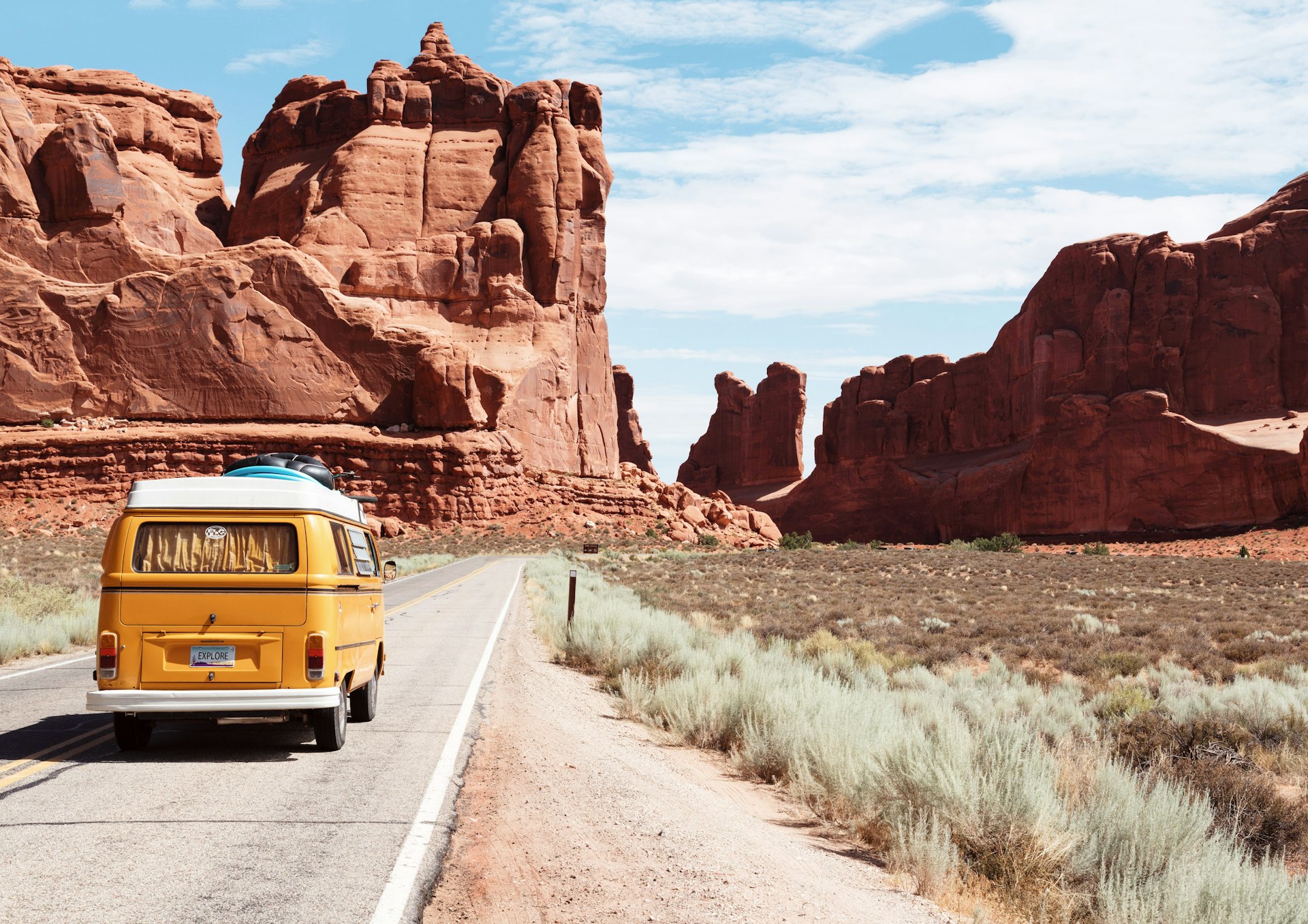 Cinematic road trip scene, golden hour, adventure brand campaign